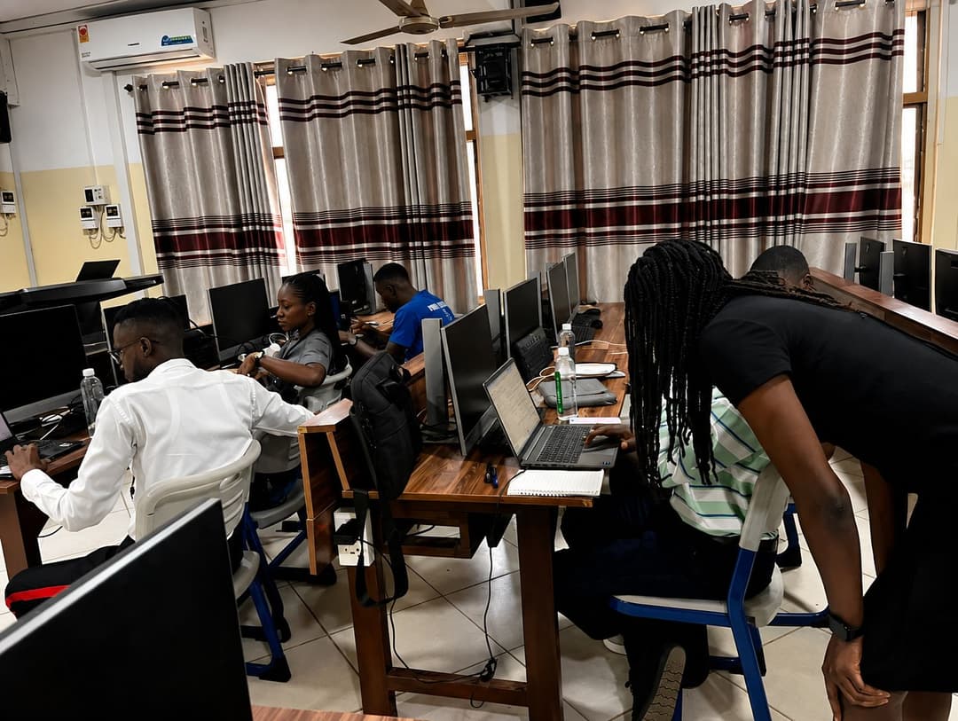 Students collaborating during an ACNEI learning session.