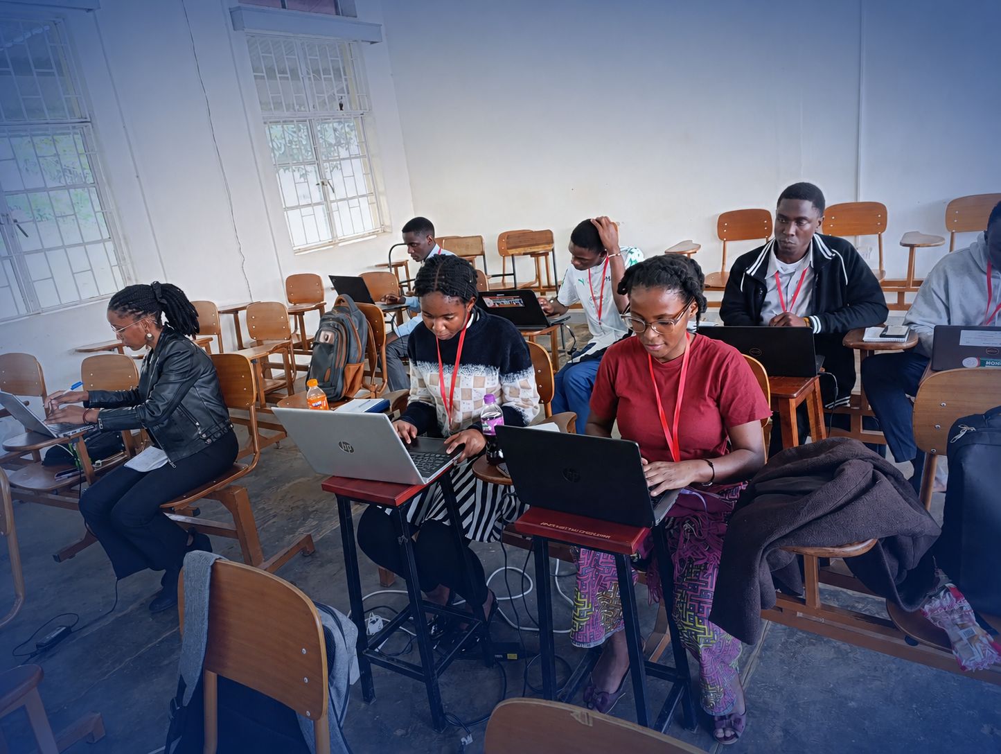 Learners working together during an ACNEI school session